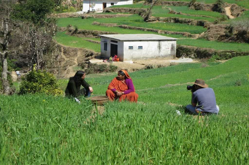 A researcher speaks to a local-research